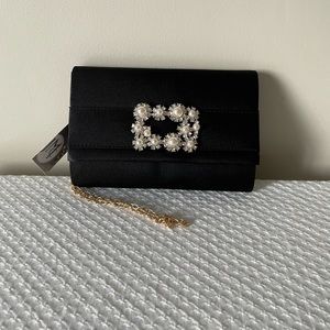 New w/ tag black clutch.